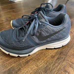 Nike women’s air zoom paragus 36 with reflecting lightening bolt pattern.